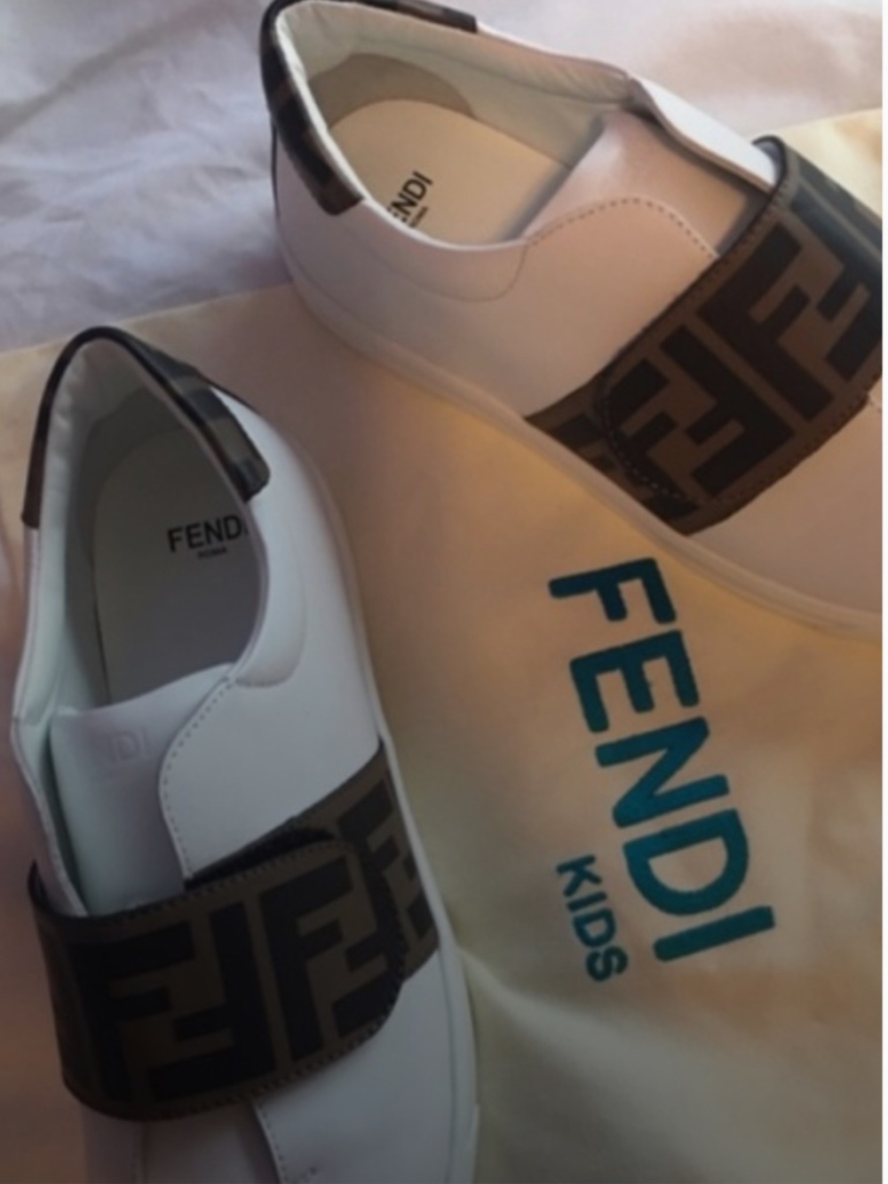 Tags, boxes, and dust bags available .